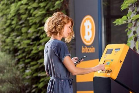 How can travellers take advantage of crypto ATMs?